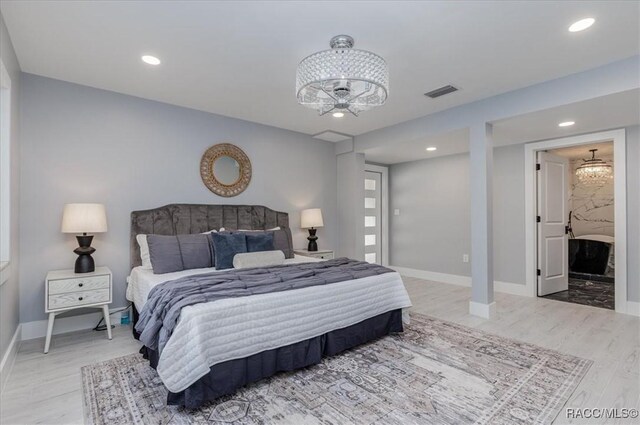 bedroom featuring hardwood / wood-style floors