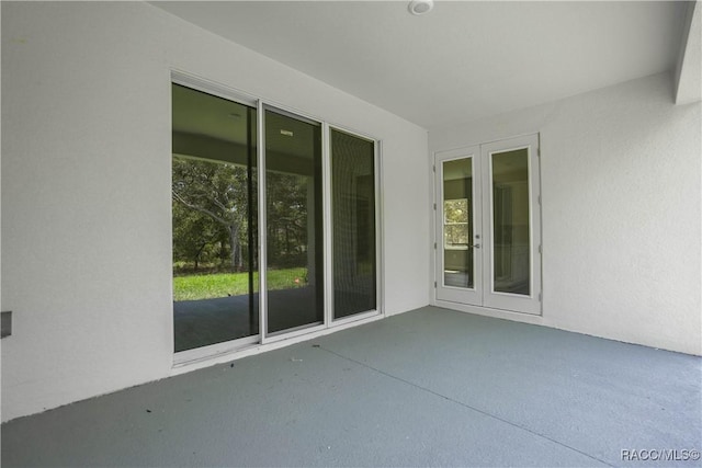 view of patio featuring french doors