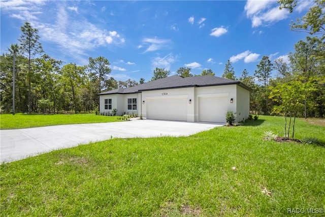 single story home featuring concrete driveway, stucco siding, a front yard, and a garage