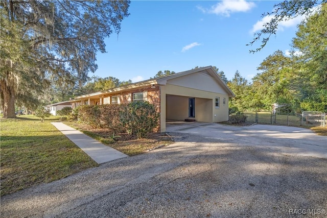 view of home's exterior with a lawn