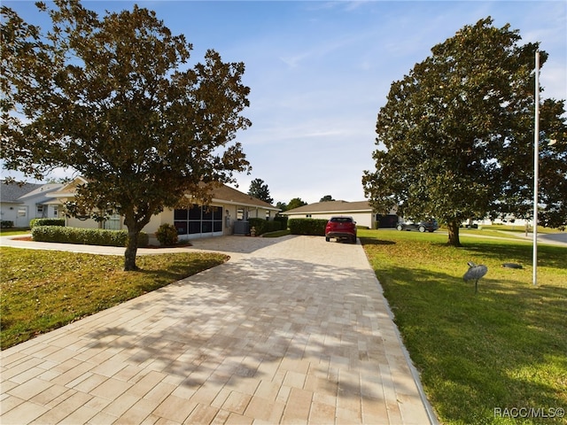 view of front facade with a front lawn