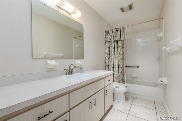 full bathroom featuring tile patterned flooring, shower / tub combo, vanity, and toilet