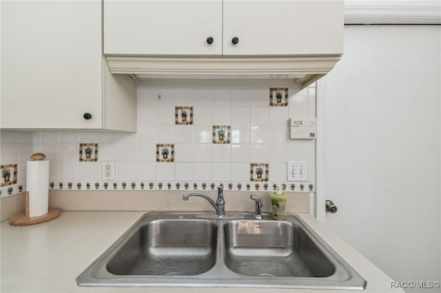 761 W Sunbird Path, Hernando, FL 34442 - kitchen with light countertops, decorative backsplash, and white cabinets