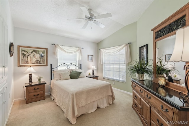 761 W Sunbird Path, Hernando, FL 34442 - bedroom with lofted ceiling, light carpet, multiple windows, a ceiling fan, and a textured ceiling