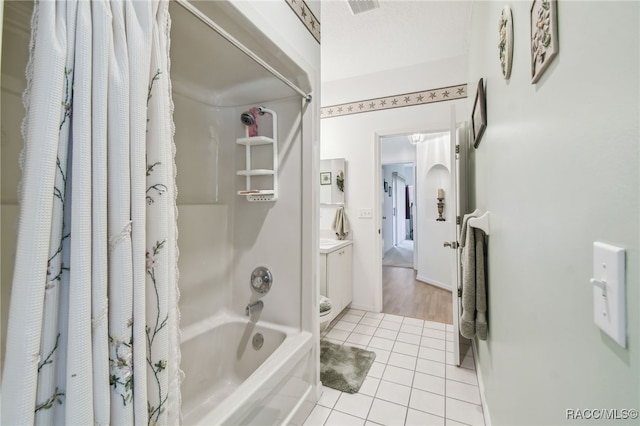 761 W Sunbird Path, Hernando, FL 34442 - bathroom featuring shower / bathtub combination with curtain and tile patterned flooring