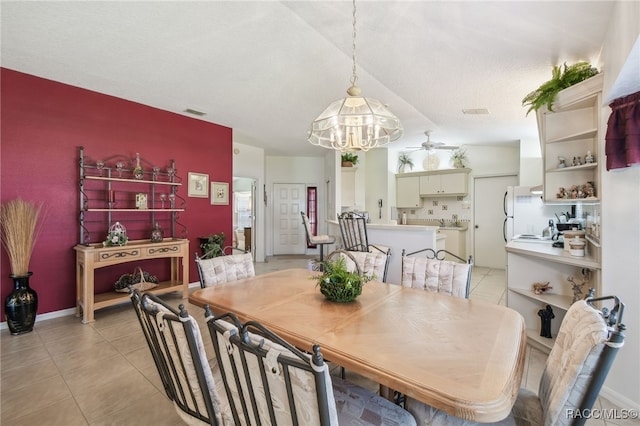 761 W Sunbird Path, Hernando, FL 34442 - dining area featuring a chandelier and light tile patterned floors