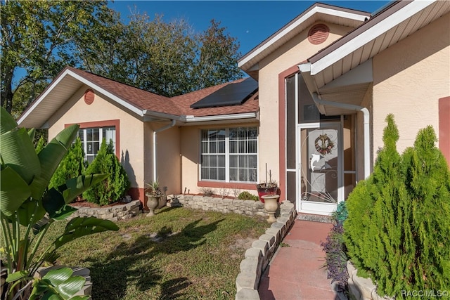 entrance to property with solar panels