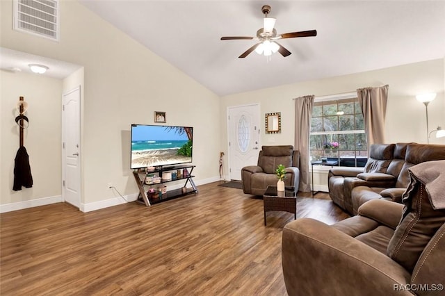 living area featuring baseboards, visible vents, a ceiling fan, wood finished floors, and high vaulted ceiling