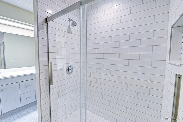 bathroom with vanity and walk in shower