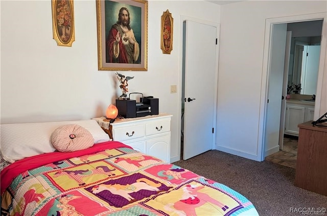 carpeted bedroom with ensuite bathroom