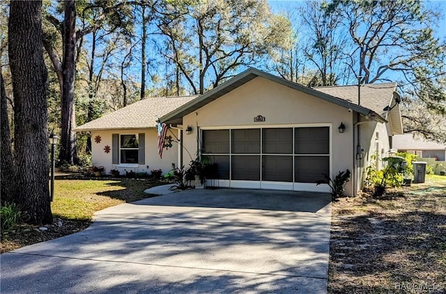 single story home featuring a garage