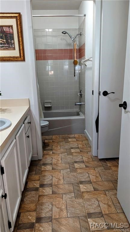 bathroom with vanity and shower / bathtub combination with curtain