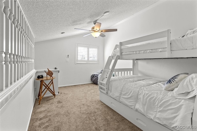 bedroom with light carpet, a textured ceiling, and ceiling fan