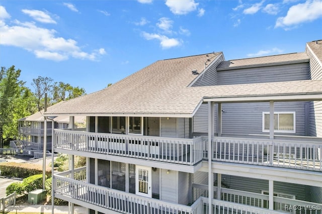 rear view of house with a balcony