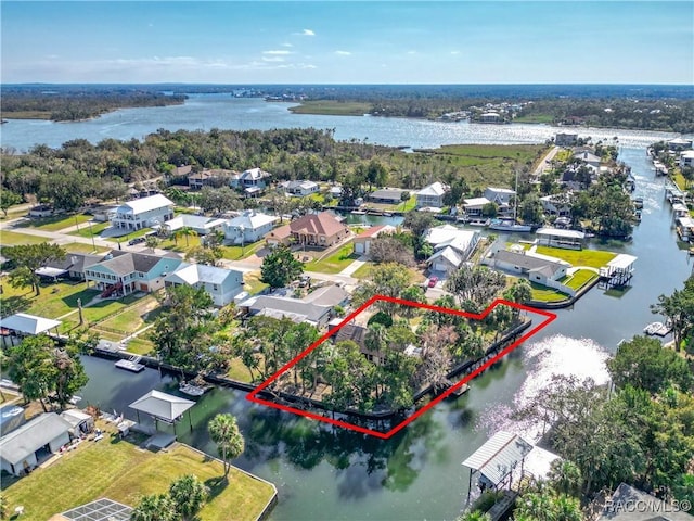 birds eye view of property featuring a water view