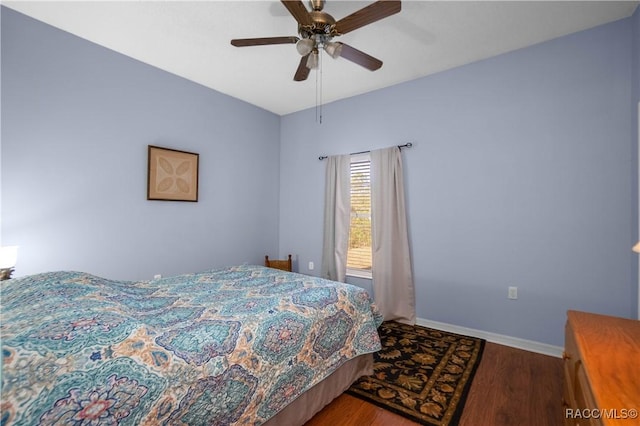 bedroom featuring ceiling fan and hardwood / wood-style floors