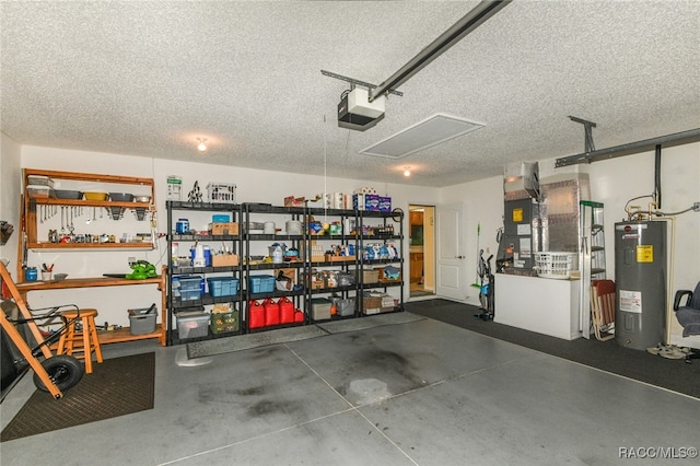 garage with electric water heater and a garage door opener