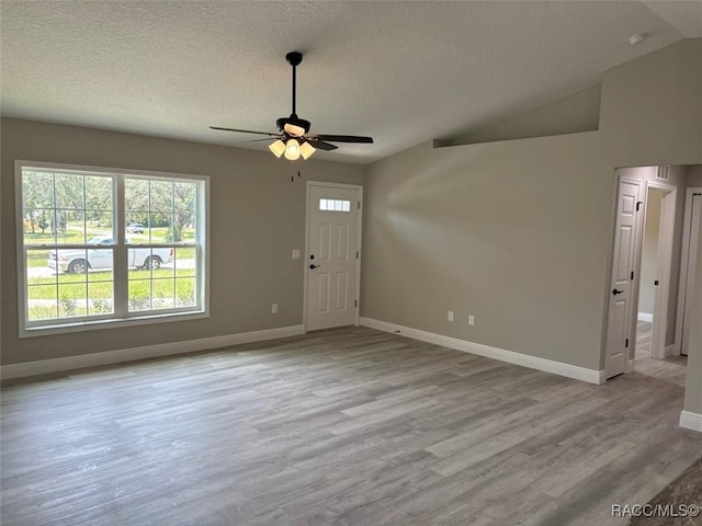 10185 N Halsey Way, Citrus Springs, FL 34434 - foyer featuring a ceiling fan, baseboards, wood finished floors, and a textured ceiling