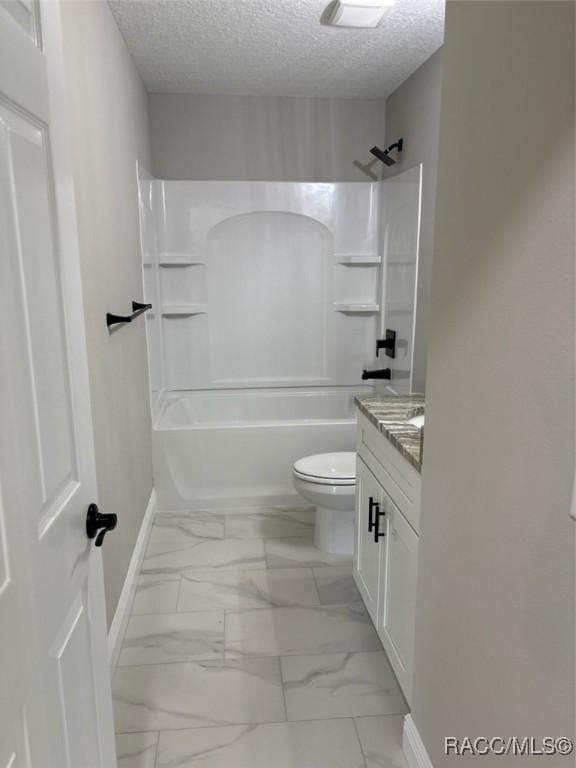 10185 N Halsey Way, Citrus Springs, FL 34434 - bathroom with marble finish flooring, vanity, toilet, a textured ceiling, and shower / tub combination
