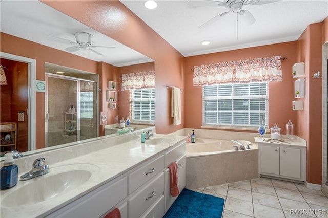 bathroom featuring tile patterned flooring, vanity, separate shower and tub, and ceiling fan