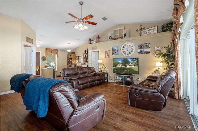 living room featuring ceiling fan, lofted ceiling, and dark wood-type flooring