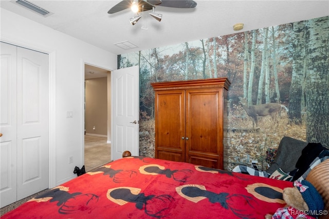 bedroom with a closet and ceiling fan