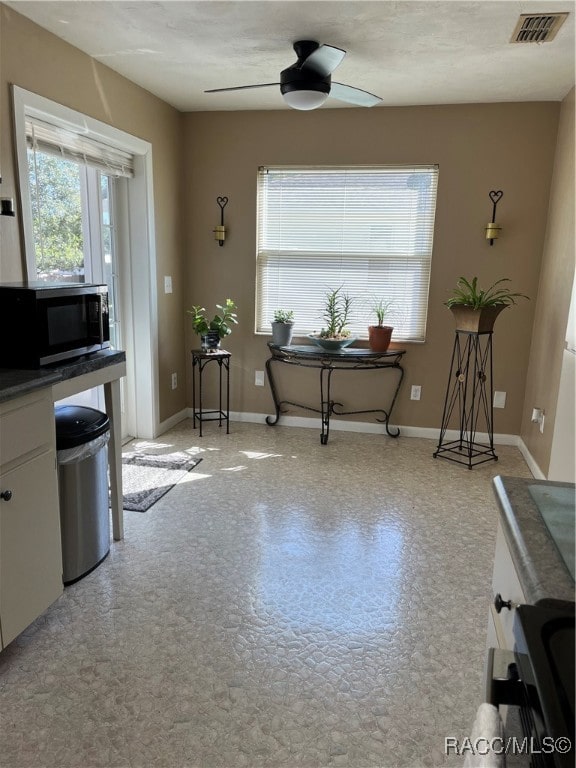 dining area featuring ceiling fan