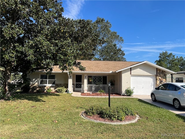 ranch-style house with a porch, a garage, and a front lawn