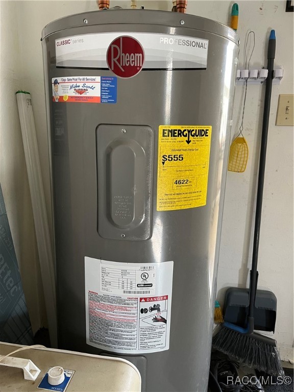 utility room with water heater