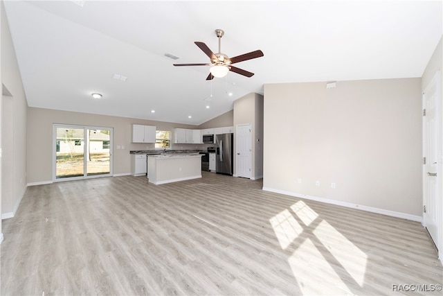 unfurnished living room featuring high vaulted ceiling, light hardwood / wood-style flooring, and ceiling fan