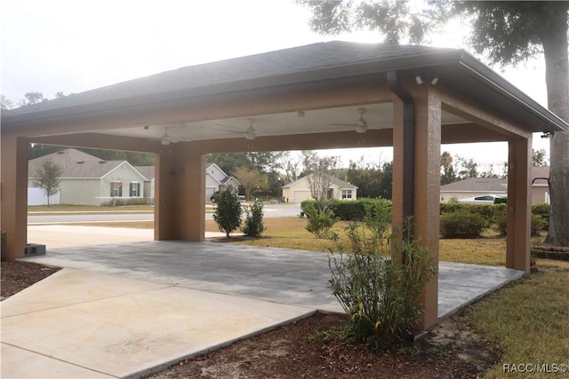 view of patio with a gazebo and ceiling fan