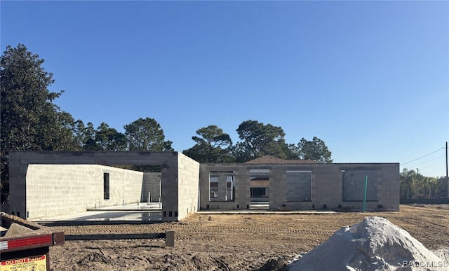 view of front facade with a patio area