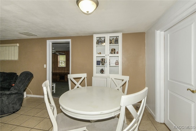 dining room with light tile patterned floors