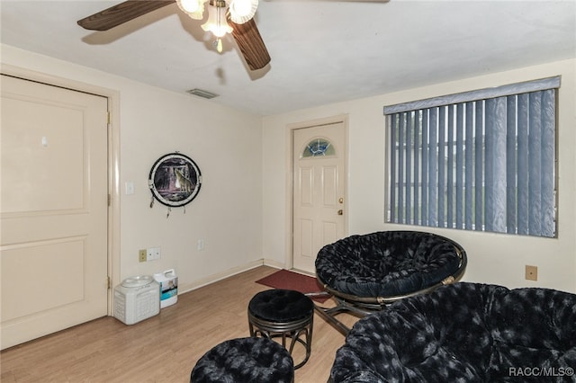 sitting room featuring hardwood / wood-style floors