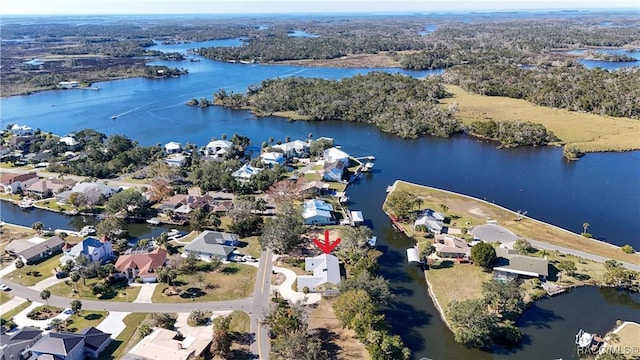 bird's eye view with a water view and a residential view