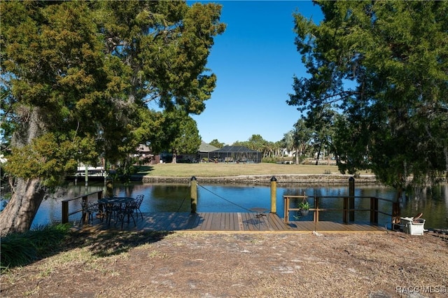 dock area featuring a water view