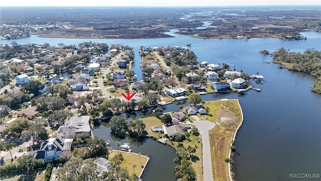 aerial view with a water view and a residential view