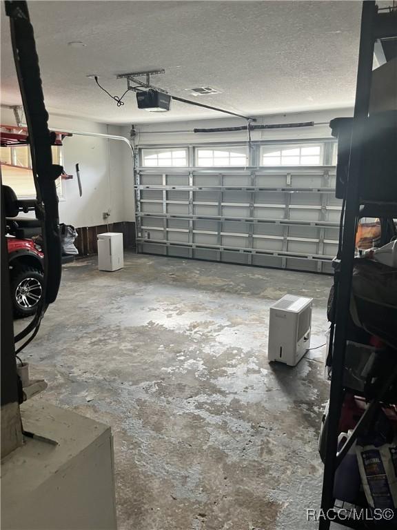 garage with a garage door opener