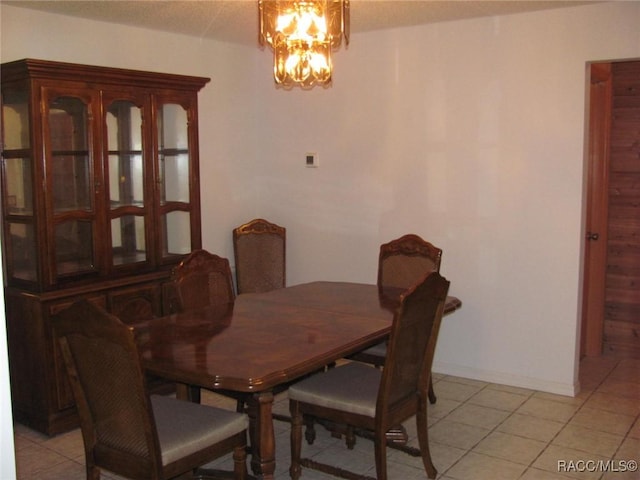 5198 N Sierra Vista Dr, Crystal River, FL 34428 - dining space with a chandelier and light tile patterned floors