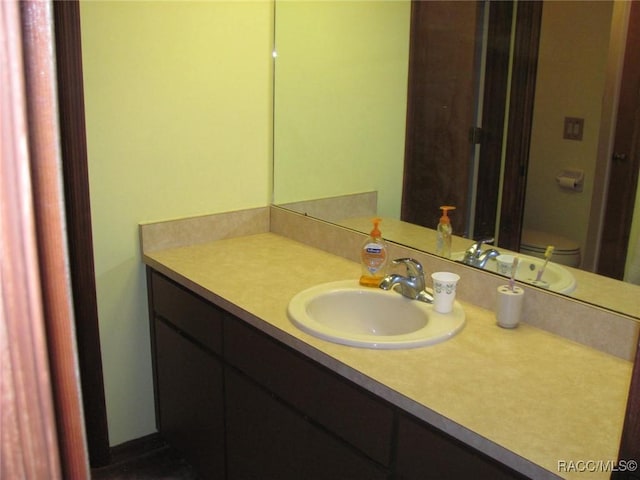 5198 N Sierra Vista Dr, Crystal River, FL 34428 - bathroom with vanity and toilet