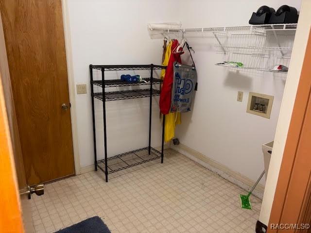 5198 N Sierra Vista Dr, Crystal River, FL 34428 - washroom featuring tile patterned floors and washer hookup