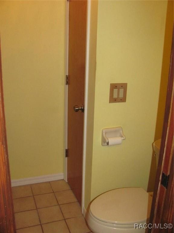 5198 N Sierra Vista Dr, Crystal River, FL 34428 - bathroom with toilet and tile patterned floors