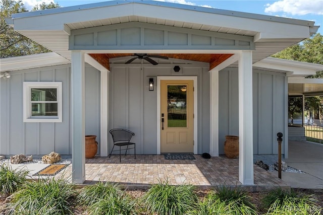 doorway to property featuring a patio area and ceiling fan