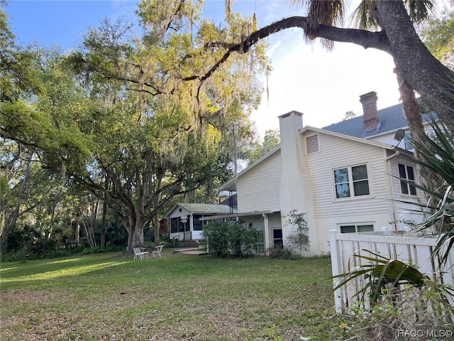 exterior space with a yard