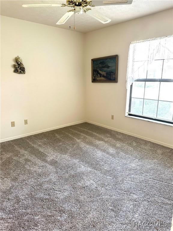 full bathroom with toilet, vanity, tile patterned floors, and shower / bath combo with shower curtain