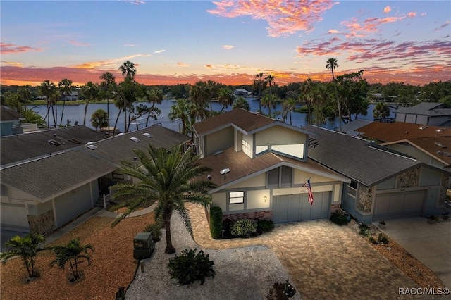 view of front of home featuring a water view