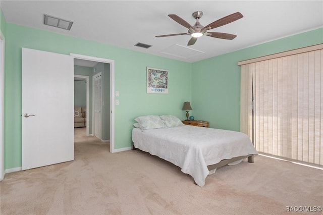 carpeted bedroom featuring ceiling fan