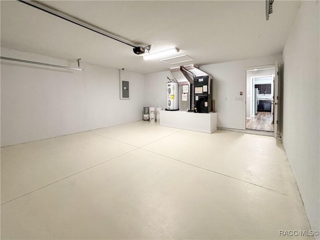 garage featuring a garage door opener, heating unit, electric water heater, and electric panel