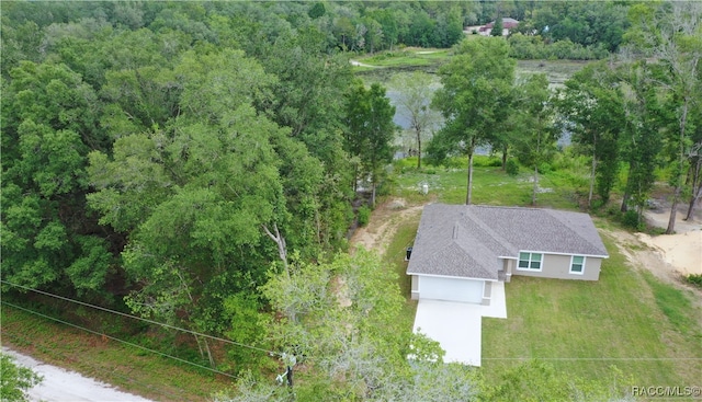 drone / aerial view with a view of trees