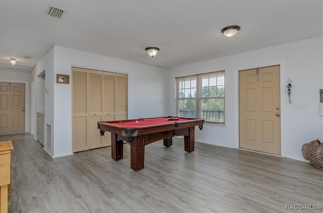 game room featuring light wood-style floors, pool table, baseboards, and visible vents